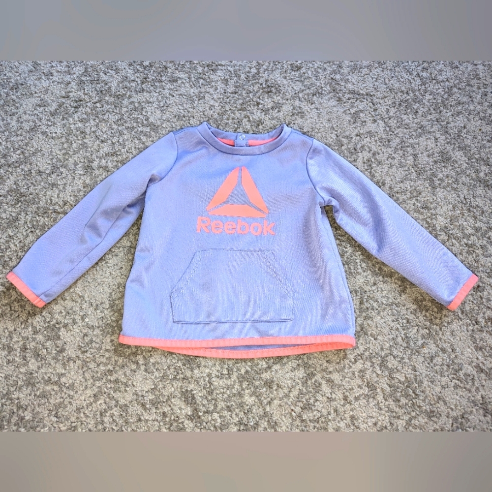 2/$20. Reebok girls sweater. Light purple. 2T. Excellent condition.